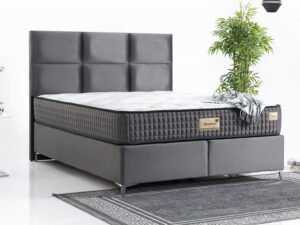 Lit boxspring haut de gamme en tissu noir avec sommier coffre et matelas orthopedique collection QUATTRO décor