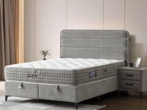 Lit boxspring complet en tissu gris au style sobre et classique ambiance equilibree collection BODY BALANCE décor
